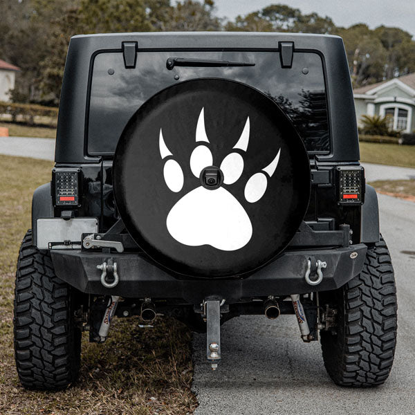 Jeep wheel cover with paw clearance prints